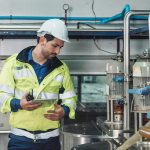 worker surveying fluid safety